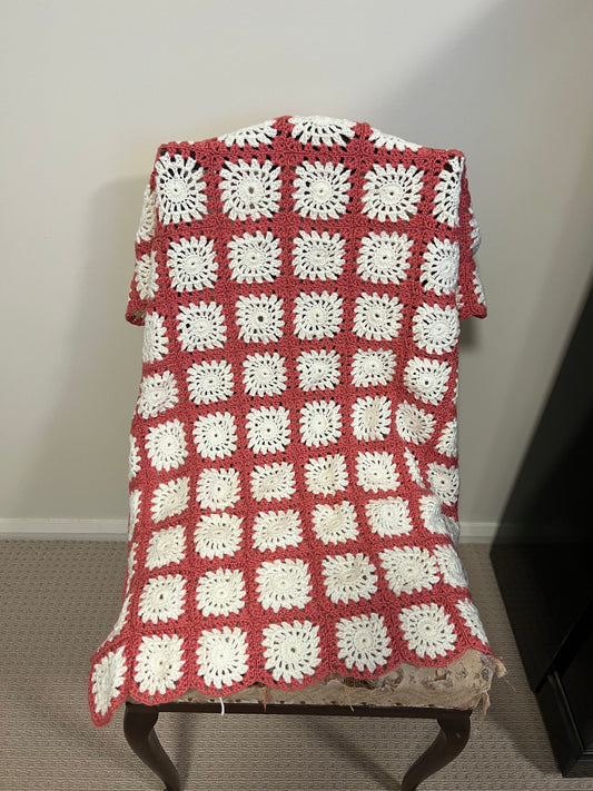 Pink and white granny square knee rug