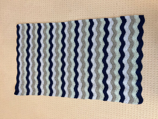 Hand crochet ripple knee blanket