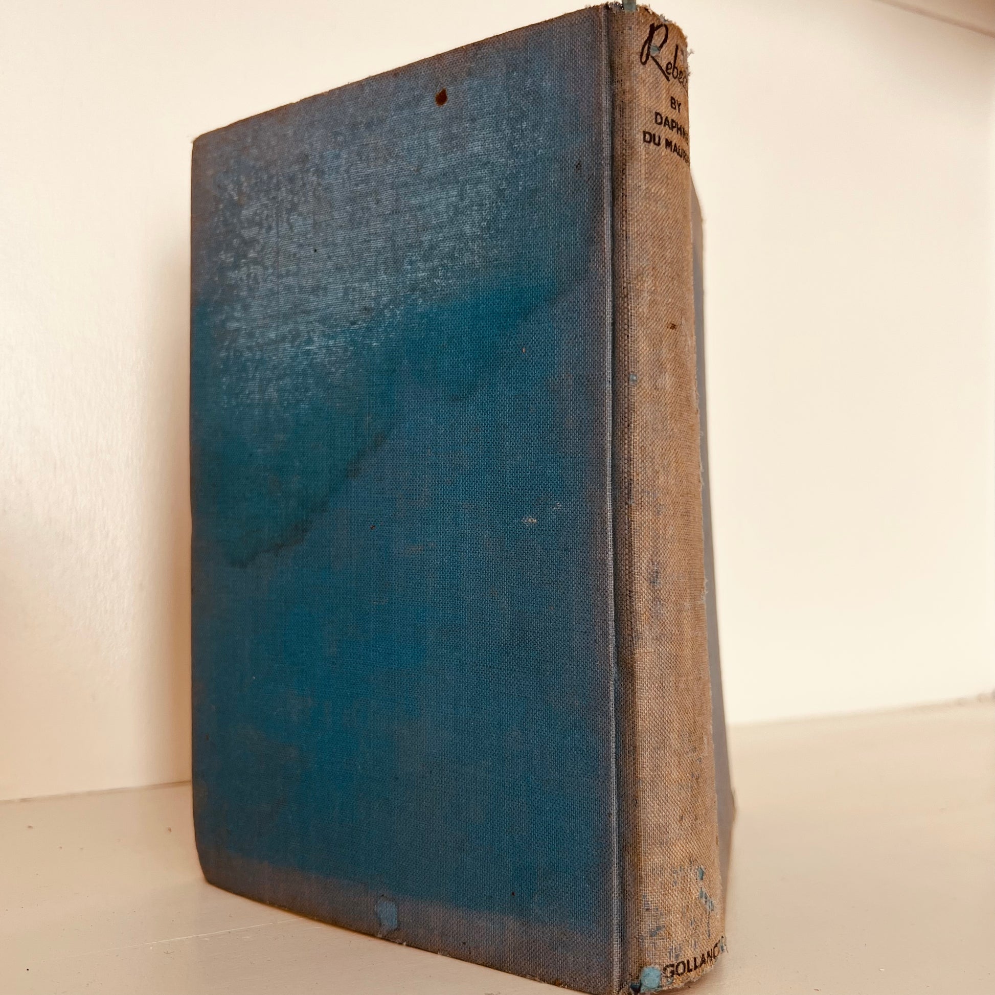 Worn book spine and blue cover