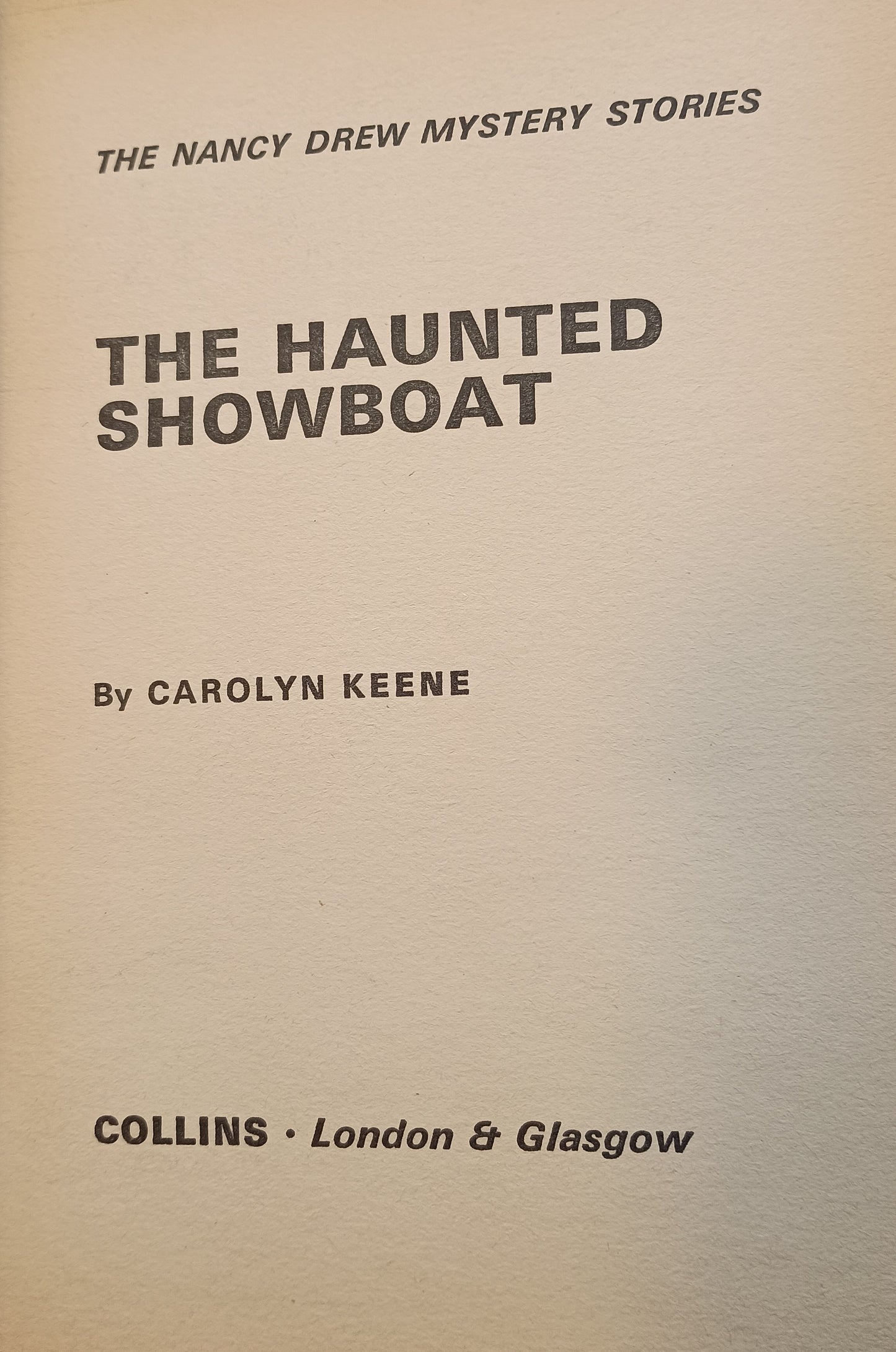 The Haunted Showboat by Carolyn Keene